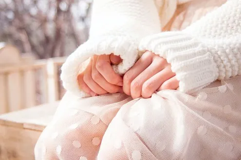A person with their hands together is wondering what the symptoms, signs & warnings are for Crack Cocaine addiction